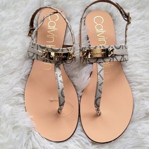 A new pair of Calvin Klein sandals for sale!